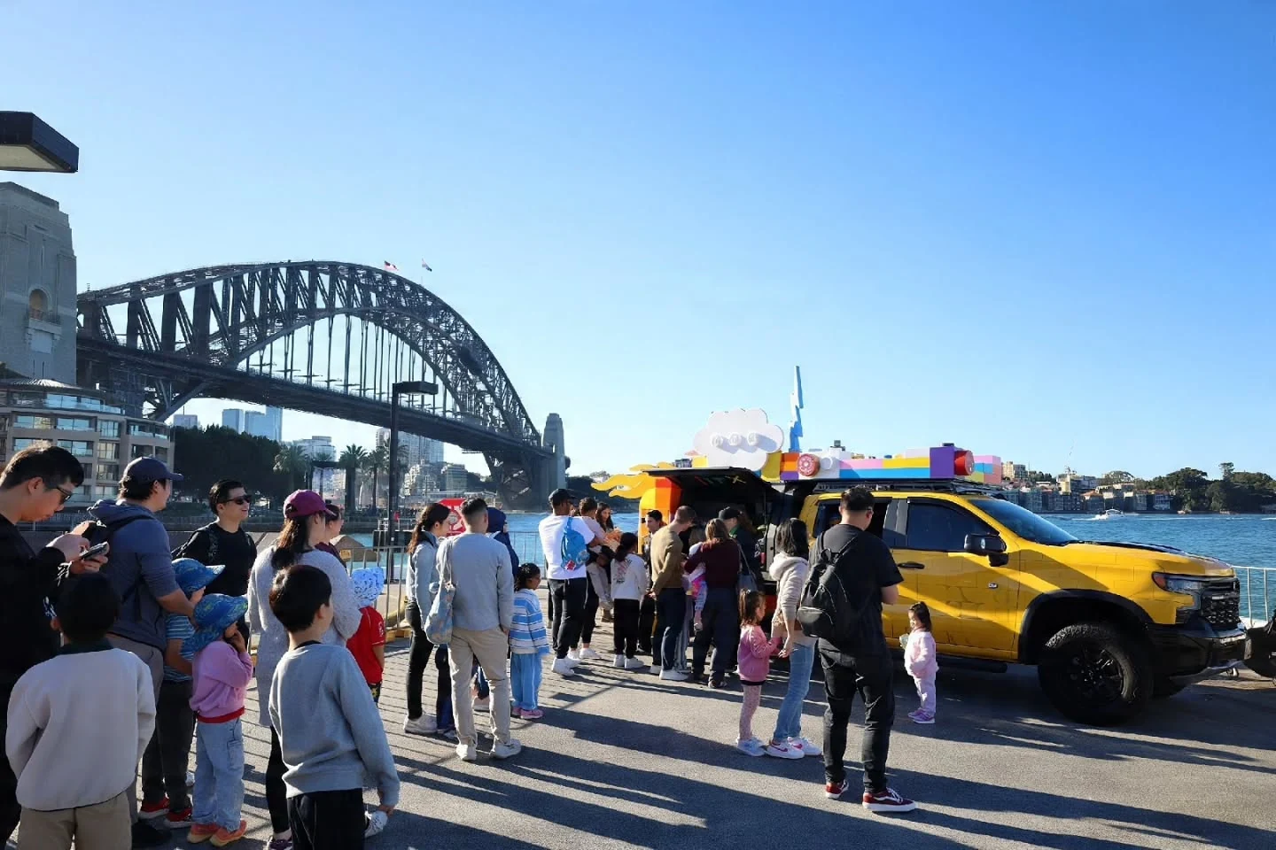 LEGO Brick Brigade activation with visitors beside Sydney Harbour Bridge